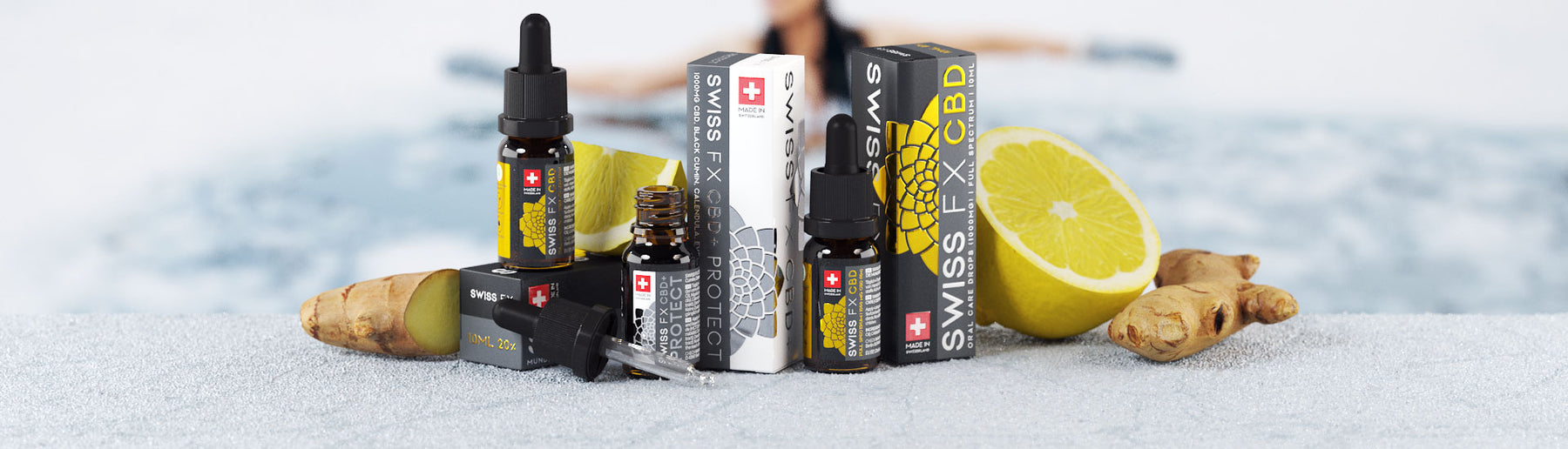 SWISS FX CBD Öl PROTECT mit Zitrone und Ingwer auf einer hellen Küchenfläche
